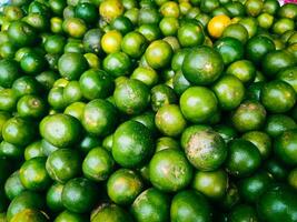 la photographie de proche en haut texture Contexte de pile de vert Orange fruit photo
