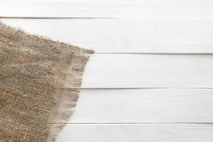 toile de jute sur blanc en bois Contexte photo