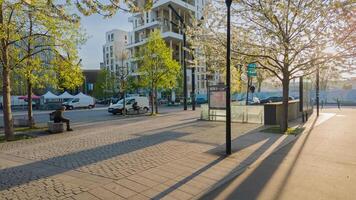 Soleil trempé printemps Matin dans Paris, France, mettant en valeur Urbain renouvellement avec épanouissement des arbres et moderne architecture sur avril 14ème, 2024 photo