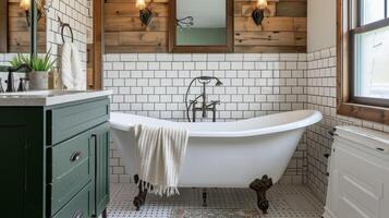 une salle de bains oasis avec une griffe baignoire métro tuile et une ancien vanité surmonté avec une style rétro miroir et appliques photo