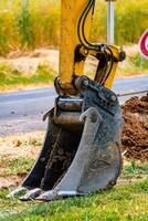 mini excavateur et seau, extérieur travaux photo