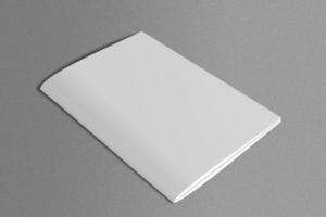 magazine blanc en surface de marbre photo