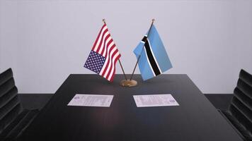 le botswana et Etats-Unis à négociation tableau. affaires et politique 3d illustration. nationale drapeaux, diplomatie accord. international accord photo