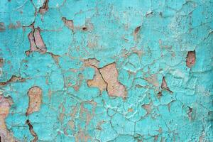 vieux patiné béton mur avec peeling peindre avec brillant bleu couleurs sur chaque couche texturé Contexte photo