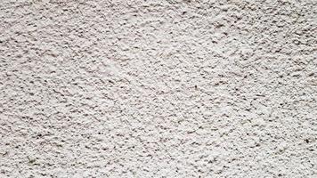 texture de mur en béton. fond de mur en stuc blanc. mur de ciment peint en blanc. mur et sol en béton blanc comme texture de fond. loft dans le style des idées de conception d'un immeuble résidentiel. photo