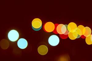 Couleur bokeh contre une foncé photo