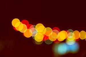 Couleur bokeh contre une foncé photo