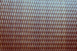 synthétique rotin texture tissage Contexte comme utilisé sur Extérieur jardin meubles. photo
