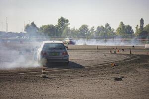 villamarzana dix septembre 2023 intense voiture course capturer le frisson de dérive sur une difficile circuit photo