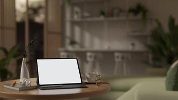 une Écran blanc numérique tablette maquette et décor sur une en bois café table dans une moderne vivant chambre. photo