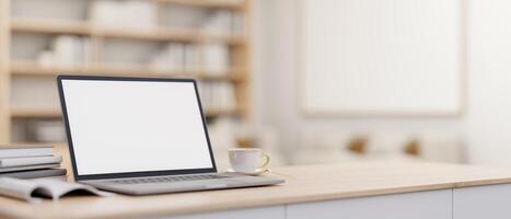 une portable ordinateur maquette sur une minimal en bois table dans une contemporain luxueux Accueil bureau. photo