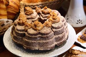 churro gâteau avec dulce de leche et sucre proche en haut photo