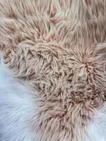 proche en haut de beige animal fourrure texture avec Naturel tourbillon motifs, détaillé macro la photographie pour conception et imprimer. photo