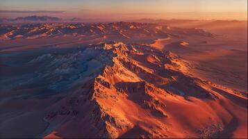 un aérien vue de une désert paysage à le coucher du soleil photo