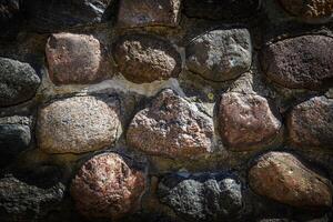 mur avec divers Taille et en forme de des pierres photo