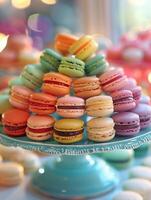 vibrant macaron assortiment sur turquoise rester. photo