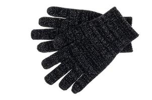 Gants de bébé en tricot noir isolé sur fond blanc photo