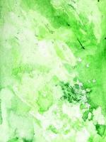 texture de soie de peinture vintage chaotique aquarelle vert clair abstrait et motif liquide abstrait. photo