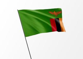 drapeau de la zambie volant haut dans le fond isolé jour de l'indépendance de la zambie. collection de drapeau national du monde illustration 3d photo