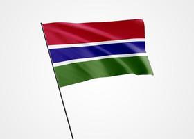 république de gambie volant haut dans le fond isolé. 18 février fête de l'indépendance de la république de gambie. collection de drapeau national du monde illustration 3d photo