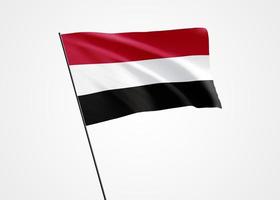 drapeau du yémen volant haut dans l'arrière-plan isolé. 30 novembre fête de l'indépendance du Yémen. collection de drapeaux nationaux du monde collection de drapeaux nationaux du monde photo