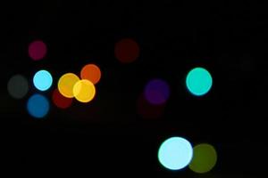 flou abstrait lumière background.colorful decoration light.abstract light.beau flou multicolore sur fond noir photo