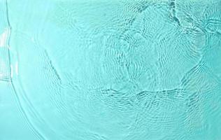 texture des éclaboussures d'eau sur fond pastel photo