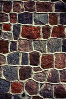 texture de mur en pierre naturelle colorée photo