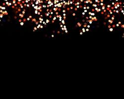 Flou orange lumières de Noël background.abstract lumières flou flou points de lumière noirs. photo