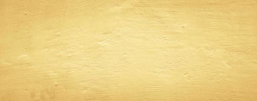 fond de texture de mur de béton jaune abstrait, fond panoramique photo