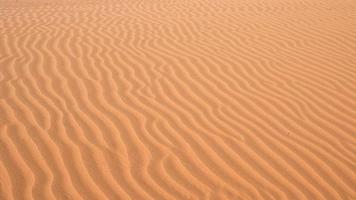 vagues de sable naturelles dans le désert du namib. Contexte. photo