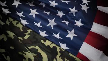 drapeau américain et motif de camouflage militaire. angle de vue de dessus. photo