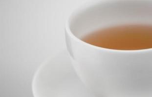 tasse de thé en céramique blanche, macrophotographie photo