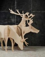 cerf de décoration du nouvel an et de noël en contreplaqué et bois photo