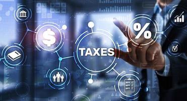 concept d'impôts payés par les particuliers et les sociétés tels que la TVA, l'impôt sur le revenu et l'impôt foncier. fond pour votre entreprise photo