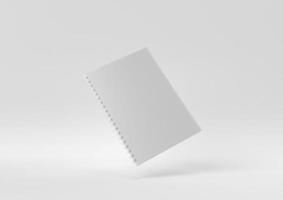 cahier blanc flottant sur fond blanc. idée de concept minimal créatif. monochrome. rendu 3D. photo