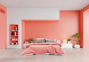 salon couleur corail chambre de maison de luxe avec lit double et étagères avec mur vivant couleur corail sur parquet.