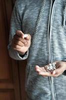 Close up of man hand holding pills with copy space photo