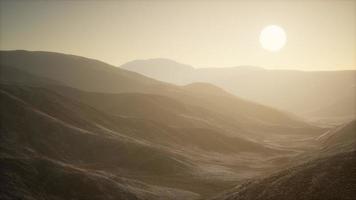 paysage de montagnes en afghanistan au coucher du soleil photo