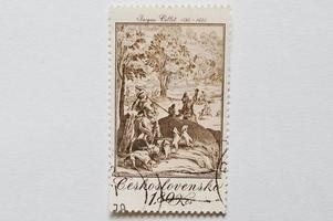 un timbre postal imprimé en tchécoslovaquie montre la grande chasse, peinture de jacques callot, graveur et dessinateur baroque du duché de lorraine, vers 1979 photo