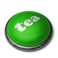 Mot de thé sur le bouton vert isolé sur blanc photo