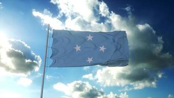 drapeau de l'état fédéré de micronésie agitant au vent contre un beau ciel bleu. rendu 3d photo