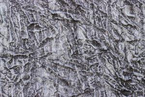 fond vieux mur de plâtre de ciment rugueux - mur plâtré avec une texture fine photo