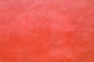 fond de béton de ciment rugueux sale texturé rouge. mur de grunge pour motif et arrière-plan. photo