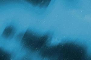 abstrait bleu clair aquarelle polaire flou futuriste stardust star pattern sur bleu foncé. photo