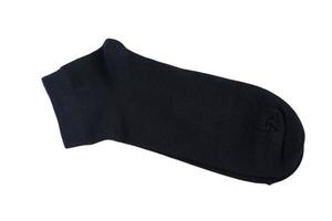 Chaussettes noires classiques sur fond blanc photo