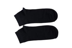 Chaussettes noires classiques sur fond blanc photo