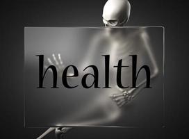 mot santé sur verre et squelette photo