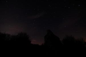 beaucoup d'étoiles et de montagne photo