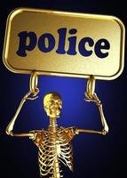 mot de police et squelette doré photo